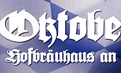 Oktoberfest Schrift in Fraktura vor Bayern Fahne